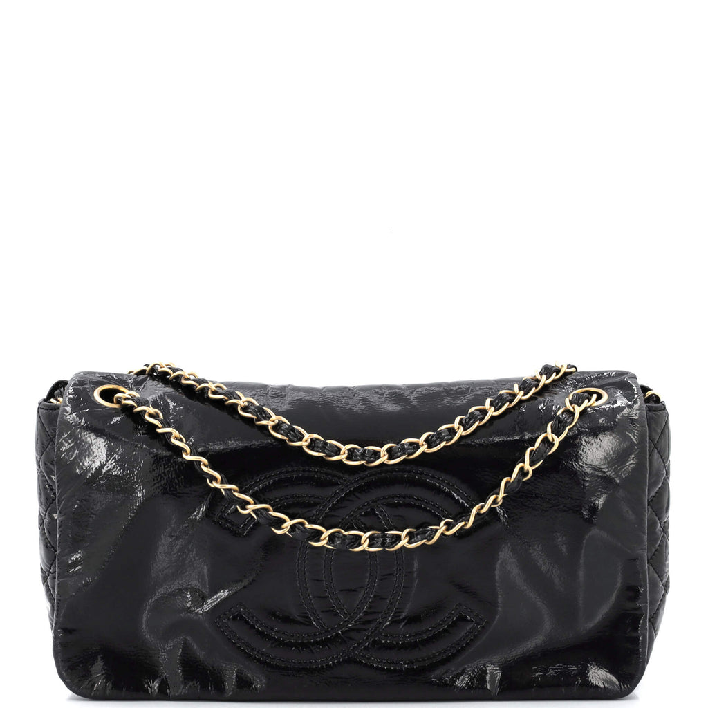 A BLACK VINYL ROCK AND CHAIN ACCORDION FLAP BAG WITH BRUSHED GOLD HARDWARE,  CHANEL, 2008