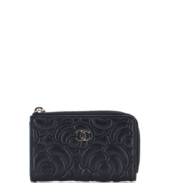 Chanel Lambskin Camellia Embossed Cosmetic Pouch Black - BrandConscious  Authentics