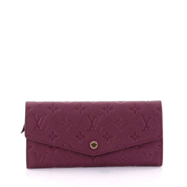 Buy Louis Vuitton Curieuse Wallet Monogram Empreinte Leather 2546303