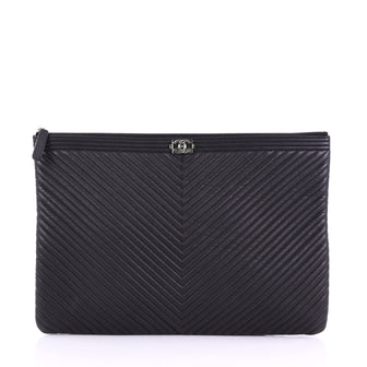 Chanel Model: Boy O Case Clutch Chevron Quilted Lambskin Large Black 38440/99