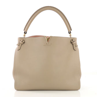Louis Vuitton Tournon Handbag Leather Neutral