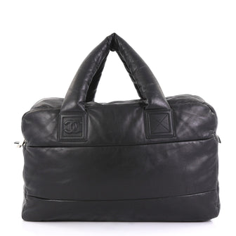 Chanel Model: Coco Cocoon Bowling Bag Quilted Lambskin Large Black 41277/64