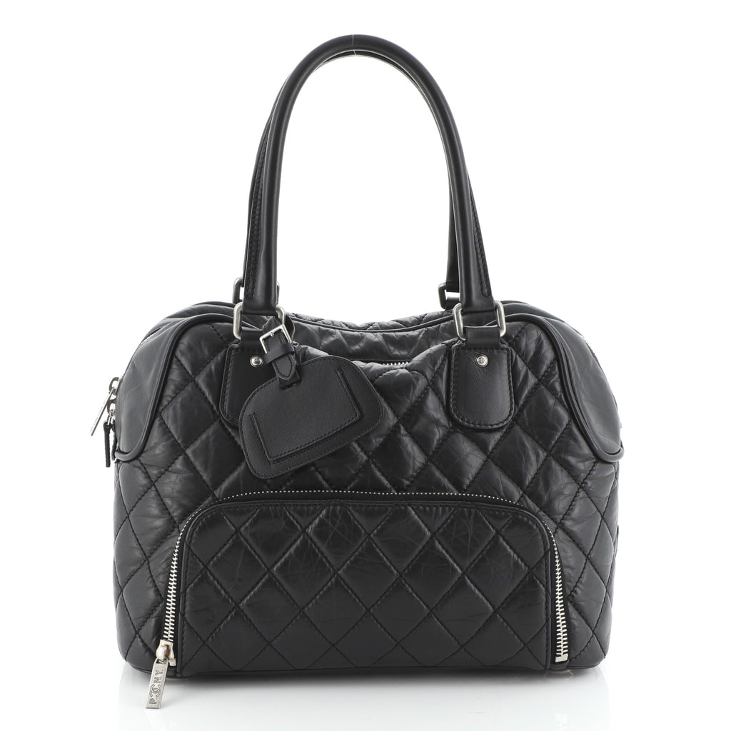 CHANEL Travel bag 50 cm In black quilted leather, zipp…