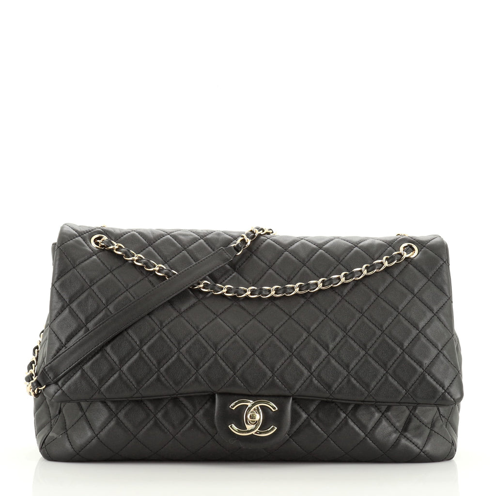 Get your hands on the stunning CHANEL NAVY XXL TRAVEL CLASSIC FLAP