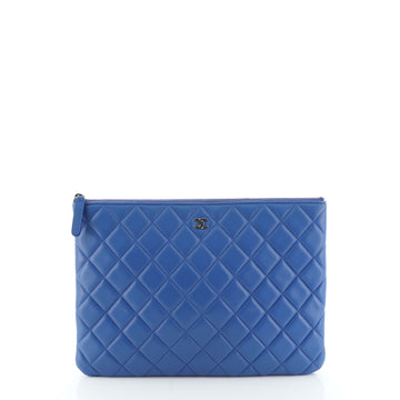 Chanel O Case Clutch Quilted Lambskin Medium