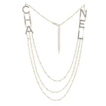 Chanel CHA-NEL Logo Triple Strand Necklace Crystal Embellished Metal and Faux Pearls