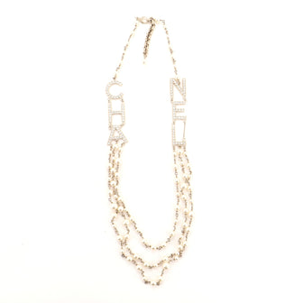 Chanel CHA-NEL Logo Triple Strand Necklace Crystal Embellished Metal and Faux Pearls