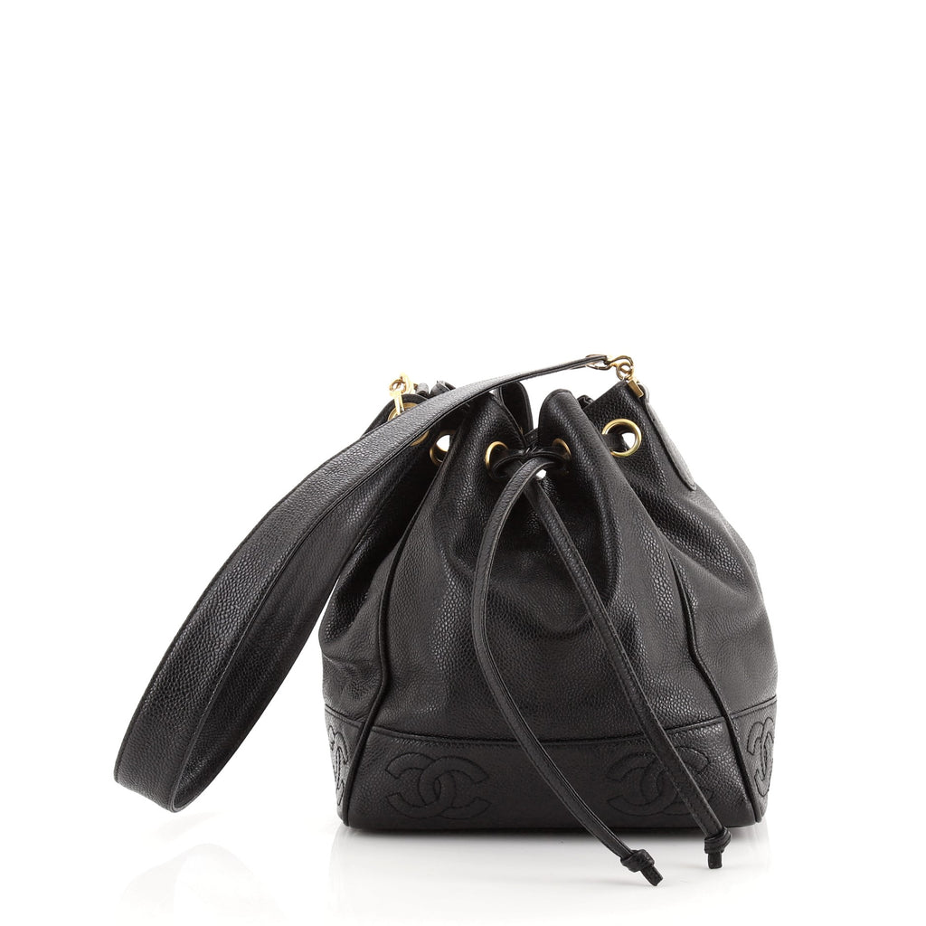 Chanel black bucket bag with logo on the front and gold detail - 1980s  second hand Lysis