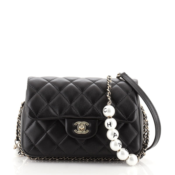 ✨NEW ARRIVAL✨ Chanel Black Lambskin Logo Pearl Flap $4,900.00