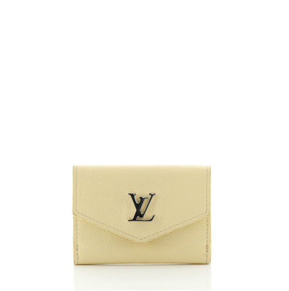 SOLD!! Authentic Louis Vuitton Lockmini Wallet