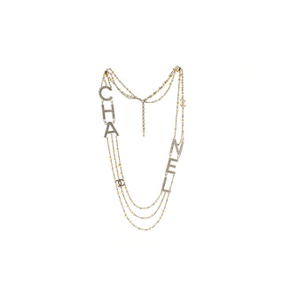 Chanel CHA-NEL Logo Triple Strand Necklace Crystal Embellished Metal and Faux Pearls