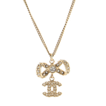 Chanel Dangling CC Ribbon Pendant Necklace Metal with Rhinestones
