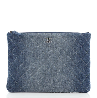 Chanel O Case Clutch Quilted Denim Medium