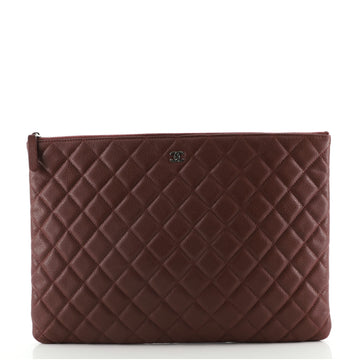 Chanel O Case Clutch Quilted Caviar Medium