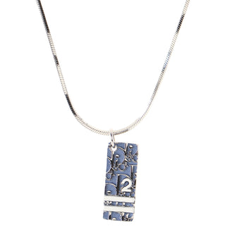 Christian Dior Trotter Pendant Necklace Earrings Metal and Enamel