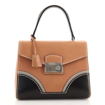 Prada Pushlock Top Handle Bag Stitched Leather Medium