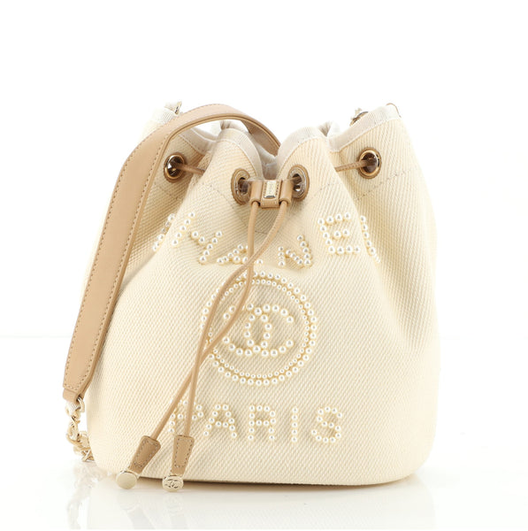 Chanel Light Beige Canvas Pearl Deauville Bucket Bag - Yoogi's Closet