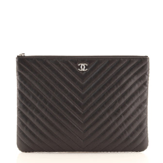 Chanel O Case Clutch Chevron Lambskin with Studded Detail Medium