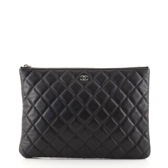 Chanel O Case Clutch Quilted Lambskin Medium