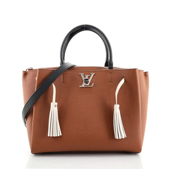 Louis Vuitton Lockmeto Handbag Leather