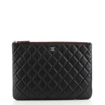 Chanel O Case Clutch Quilted Lambskin Medium