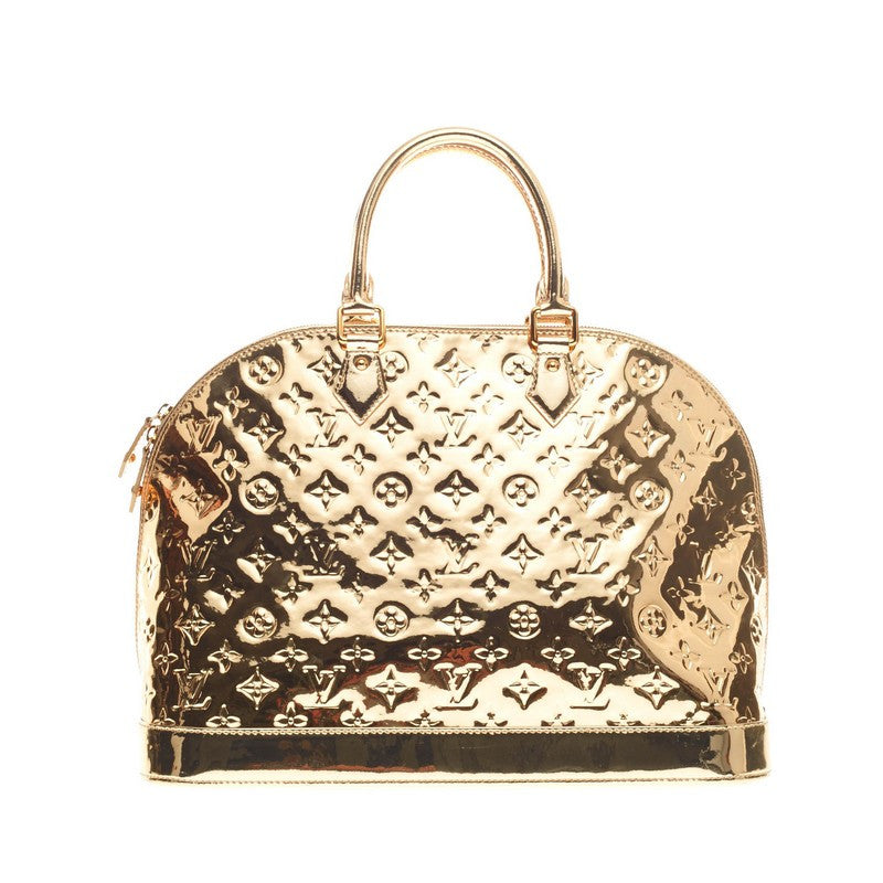 Louis Vuitton Limited Edition Gold Monogram Miroir Alma MM Bag - Yoogi's  Closet